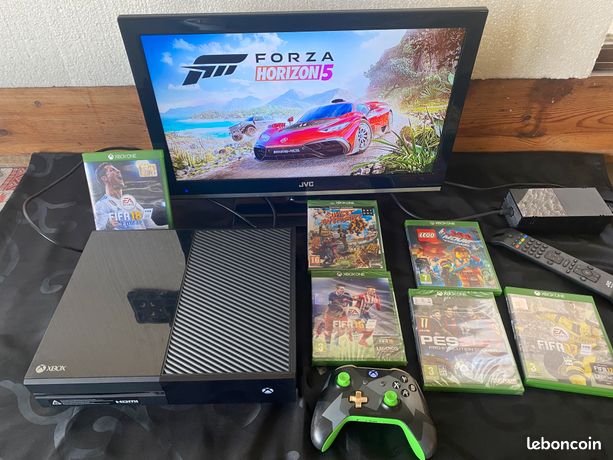 console Microsoft Xbox One plus manette sans fil plus jeux