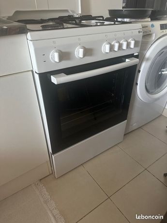 Cuisinière 3 feux gaz ville 1 électrique et four électrique
