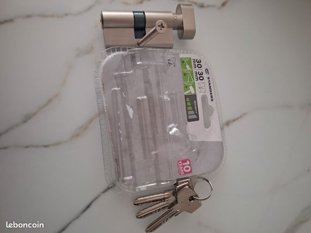 Cylindre de serrure avec bouton