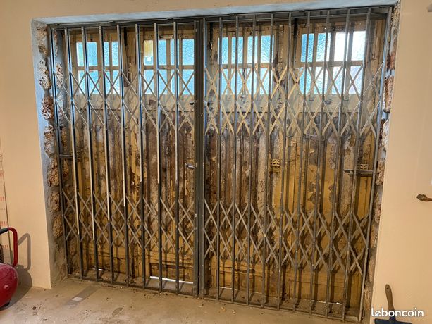 Grille extansible de protection magasin ou garage + une 2eme