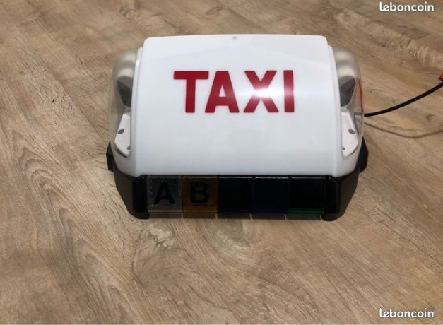 Lumineux taxi