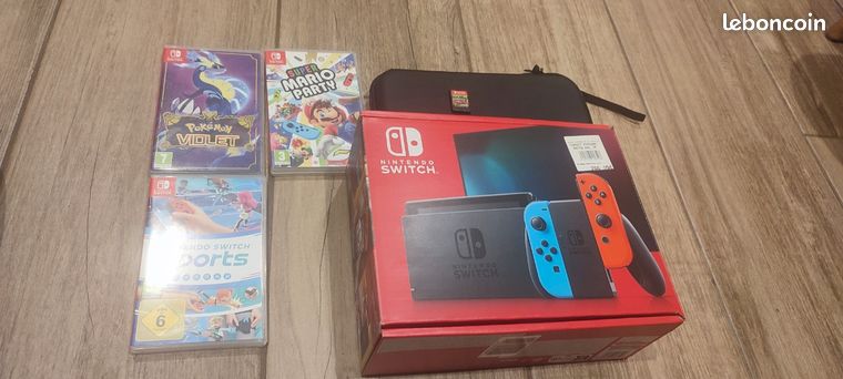 Nintendo switch 1 V2 en excellent état + 4 jeux