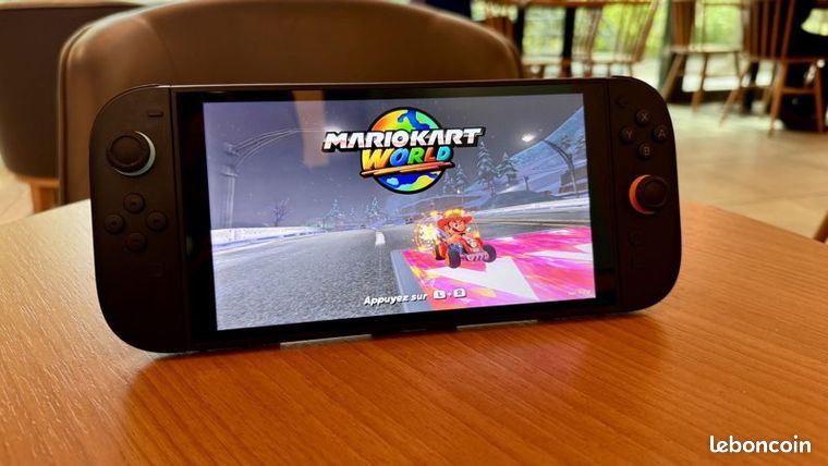 Nintendo Switch 2 pack Mario Kart comme neuf