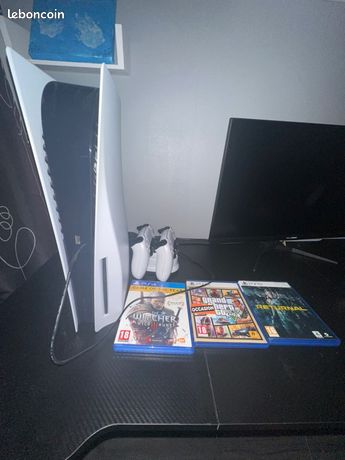 Ps5 lecteur cd + 2 manette + jeux