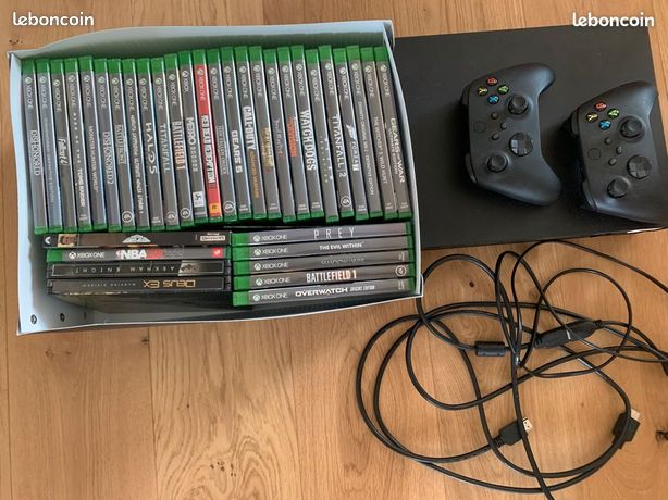Xbox One X + 2 Manettes Series X + 30 jeux